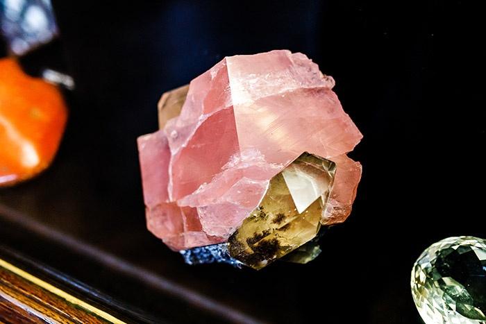 pink stone morganite with admixture of another citrine mineral