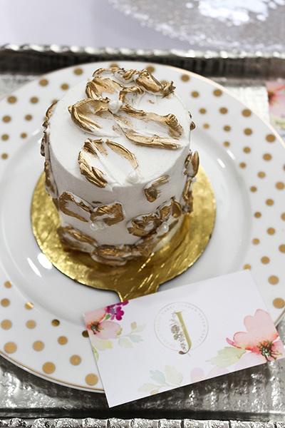 Jordan Ellen wedding cake decorated with gold leaf