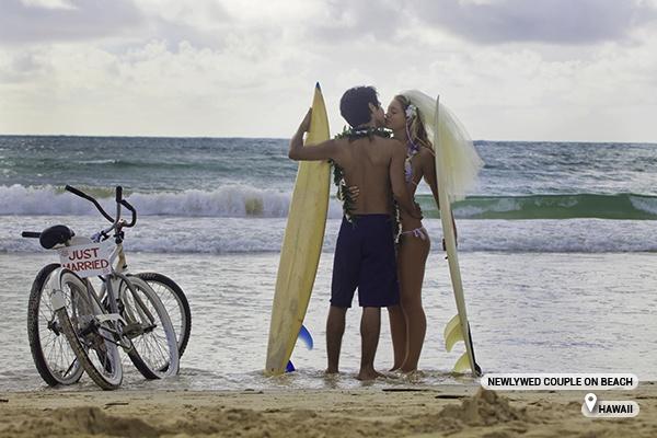 Photo – newlywed couple on beach, Hawaii