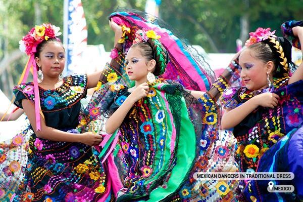 Mexican dancers perform in traditional costumes, Mexico 